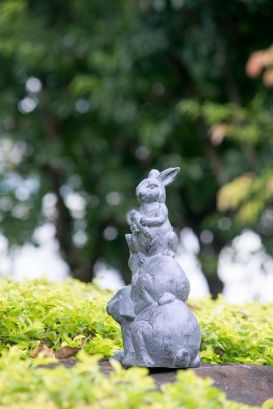 Charming Rabbit Family Planter in gray fibreglass resin, perfect for indoor/outdoor plants and vibrant blooms.