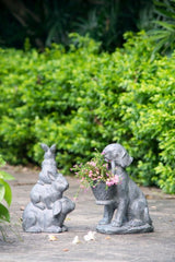 Charming dog-shaped planter in gray, perfect for colorful blooms or succulents, ideal for indoor and outdoor decor.