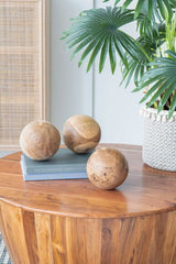 Set of three 150mm decorative teak balls showcasing natural wood grain, perfect for modern or rustic home decor.