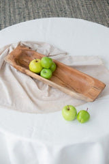 Elegant 48.5cm x 13.5cm teak rectangle tray, perfect for serving drinks or displaying snacks with a unique wood grain.