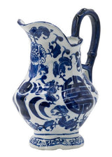 Charming 23cm blue and white porcelain milk jar with sculpted handle, perfect for traditional kitchen decor.