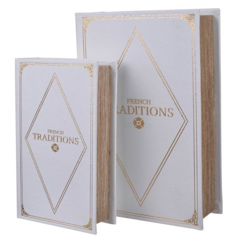 Stylish white faux leather book boxes with gold accents, perfect for storing keepsakes and enhancing home decor.