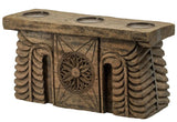 Antique black carved pillar candle holder designed for three candles, adding vintage elegance to any tabletop decor.