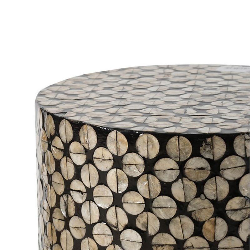 Natural shell finish footstool with illustrated circle pattern, featuring a sleek black base, ideal for modern interiors.