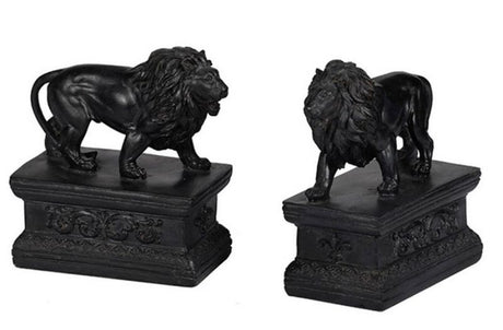 Lion bookends in glossy black resin, adding charm and sophistication to bookshelves and home decor. Perfect for book lovers.