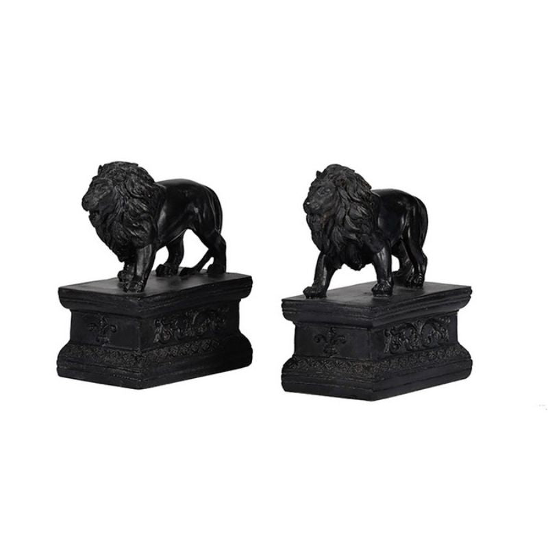 Whimsical lion bookends in glossy black resin, perfect for organizing books with charm and style in any decor.