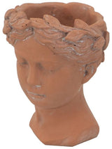 Terracotta visage head planter, 23cm, showcasing unique design; perfect for indoor or outdoor plants, durable with excellent drainage.