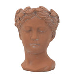 Terracotta visage head planter (23cm) with unique design for indoor/outdoor decor, ideal for various plants.