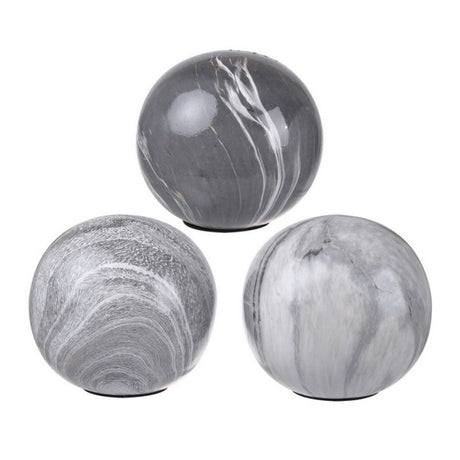 Set of 3 grey marbleised ceramic balls, each 4 inches, featuring elegant patterns and flat bottoms for versatile decor use.