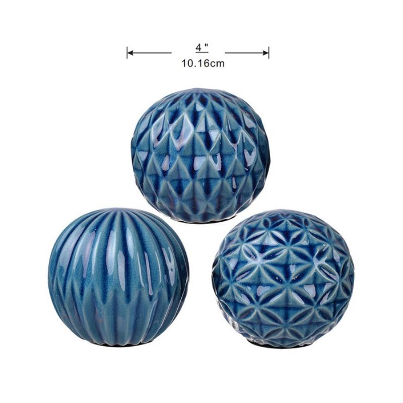 Set of 3 blue marbleised ceramic balls, each with unique patterns, perfect for elegant home decor and floral arrangements.