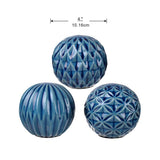 Set of 3 blue marbleised ceramic balls, each with unique patterns, perfect for elegant home decor and floral arrangements.