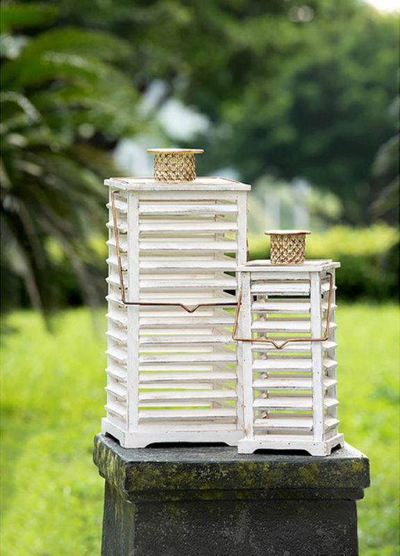 Set of 2 rustic Hesper hanging garden lanterns with distressed whitewash finish and metal details for outdoor ambiance.