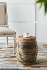 Rattan Drum Ottoman with vibrant rope wrap, barrel shape, blue-gray tones, perfect for decor and versatile use in modern homes.