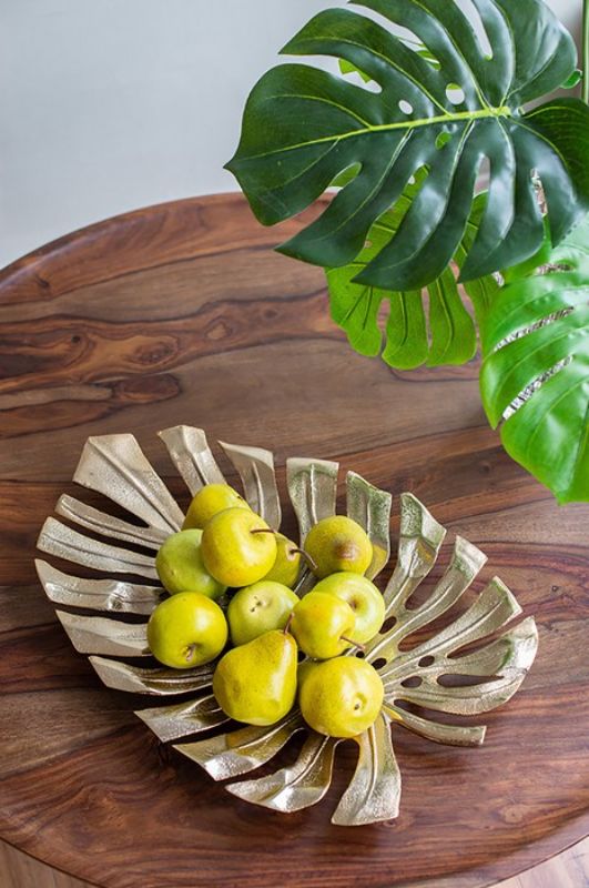 Gold Aluminium Leaf Bowl featuring a Monstera leaf design, perfect for adding modern elegance to any interior decor.