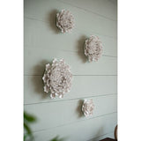 Handmade ceramic white flower wall decor, 18.5cm, featuring a serene cream finish for elegant home aesthetics.