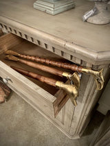 Elegant walnut finish shoe horn with brass accents, featuring a unique bird head design and measuring 55 cm for stylish shoe access.