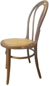 Vienna Bentwood Dining Chair in Antique Oak with woven rattan seat, 82cm tall, combining style and durability for dining areas.