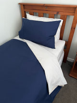 Reversible duvet set in navy and silver for King beds, featuring soft polyester-cotton blend for luxury and easy care.