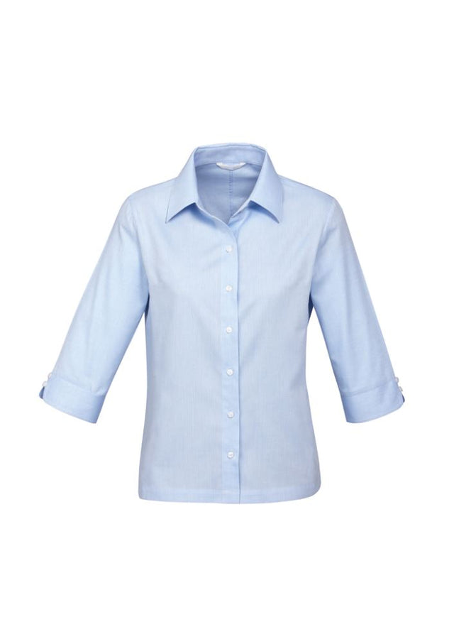 Sophisticated blue 3/4 sleeve ladies shirt with cuff detail, darts for shape, and easy iron, wrinkle-free fabric.