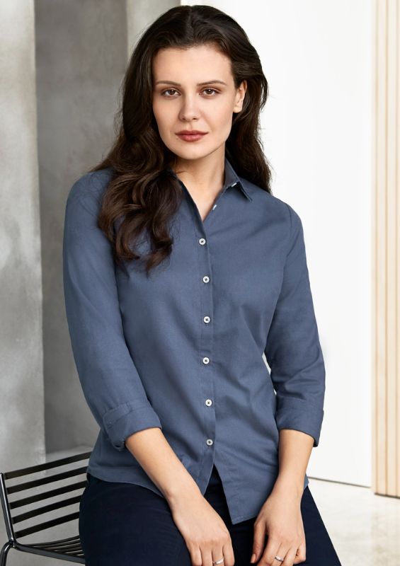 Ladies Mineral Blue Memphis L/S Shirt in Size 22 with a semi-fitted silhouette, soft oxford fabric, and stylish shirt tail hem.