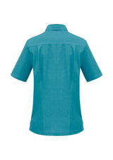 Teal ladies overblouse with action back pleats, long length, and left chest pocket, crafted from breathable polyester.
