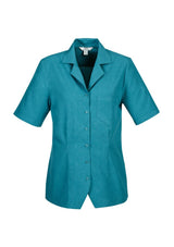 Teal overblouse in size 16, featuring breathable fabric, side splits, and a chest pocket for stylish comfort.