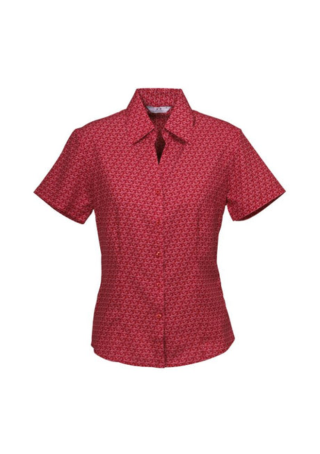 Ladies cherry short sleeve shirt with unique print, breathable fabric, and stylish curved hem for versatile wear. Size 10.