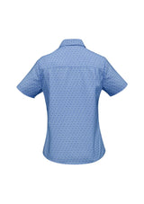 Mid blue short sleeve shirt for ladies, size 26, made from breathable polyester with a stylish open neckline and curved hem.