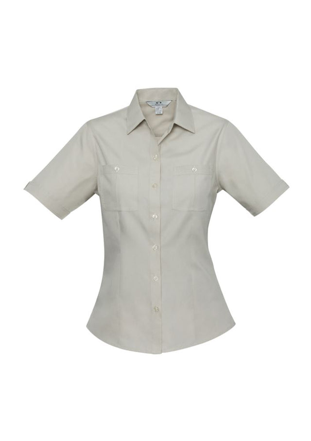 Ladies Bondi Short Sleeve Shirt in Sand, Size 10, features twin chest pockets and a stylish curved hem for versatile wear.