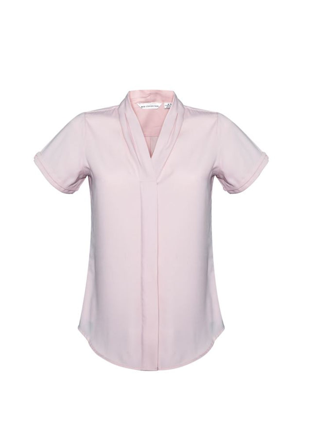 Blush pink short sleeve blouse in size 16, featuring secret button, action back pleat, and easy-care mechanical stretch fabric.