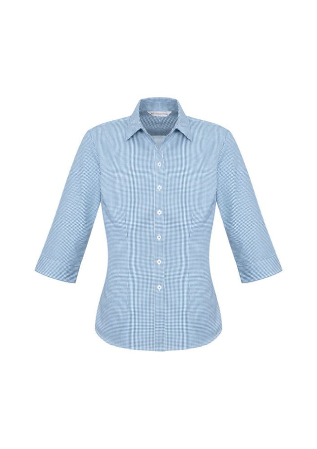 Ladies blue 3/4 sleeve shirt with check pattern, back pleats, waist darts, and curved hem for a stylish fit. Size 8.