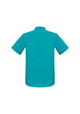 Teal short sleeve men's shirt with modern collar, chest pocket, and curved hem, designed for comfort and style in size XS.