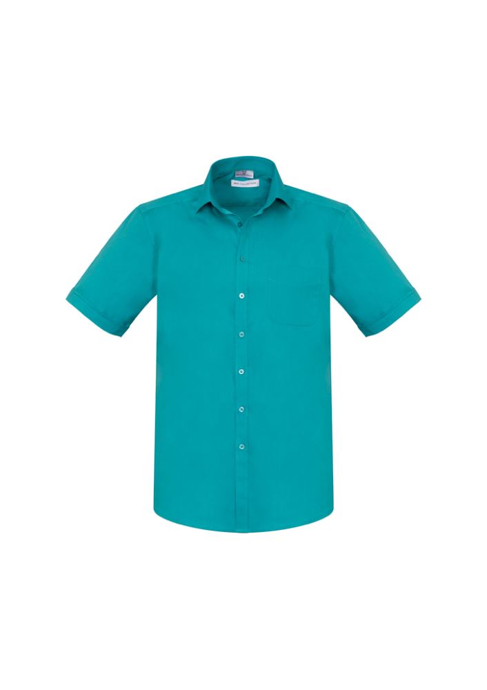Men’s short sleeve turquoise shirt with modern collar, chest pocket, and curved hem for a stylish, comfortable fit.