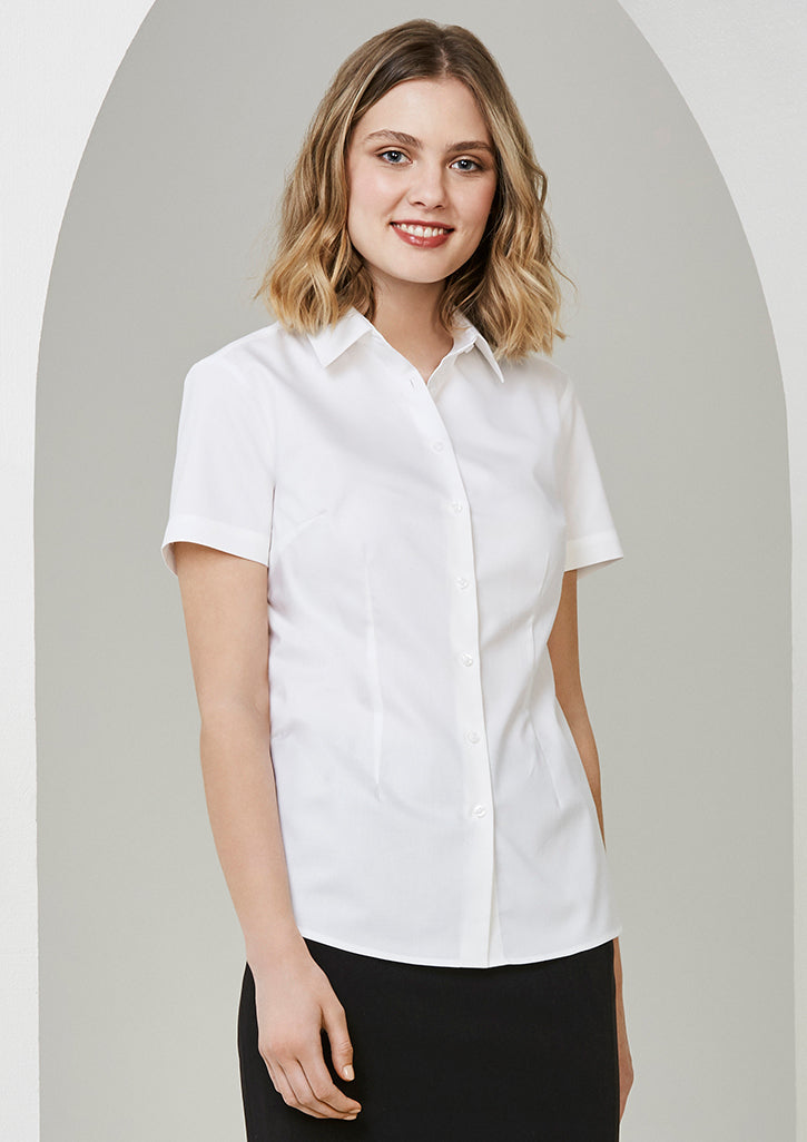 Ladies Regent S/S Shirt in white, size 18, featuring flattering darts and wrinkle-resistant 100% premium cotton fabric.