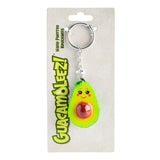 Set of 6 hand-painted avocado keychains with cute designs, perfect for quirky accessory lovers.