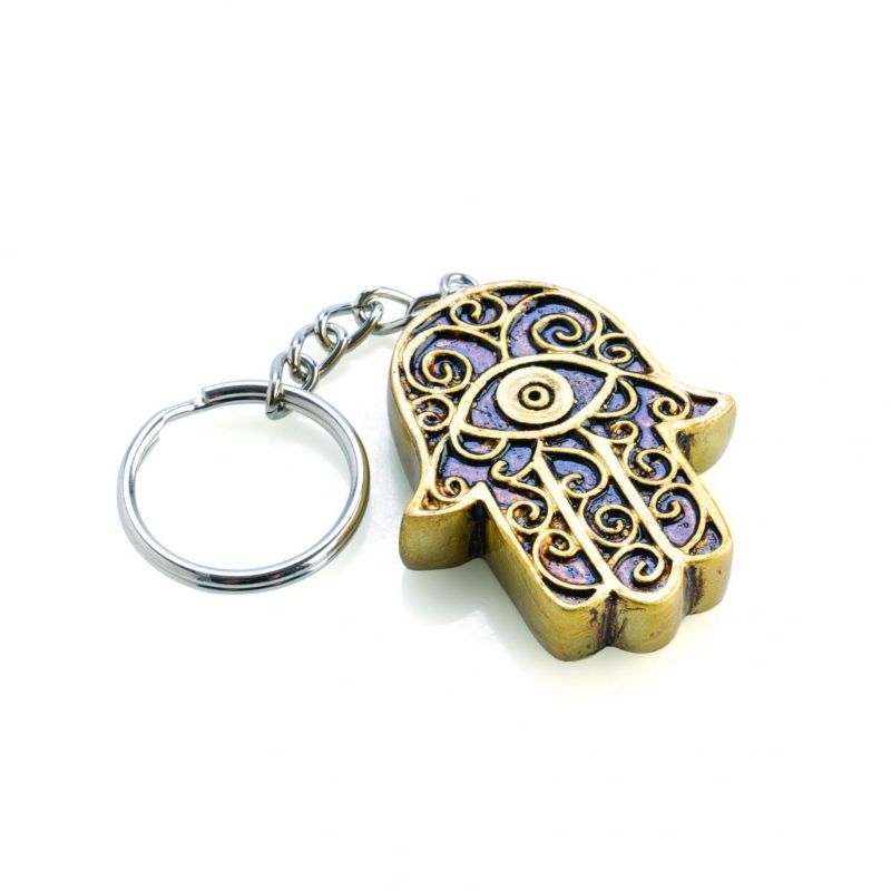 Set of 6 hand-painted hamsa keychains with metallic finish, symbolizing protection and elegance for everyday use.