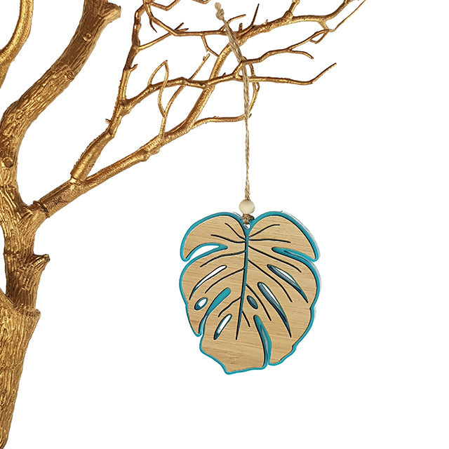 Teal satin acrylic monstera leaf hanging ornament, 104mm, perfect for modern decor or as a thoughtful gift.