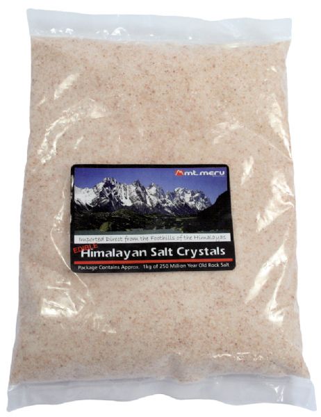 Fine edible Himalayan salt in a 1kg bag, rich in minerals, ideal for cooking and enhancing flavors in dishes.