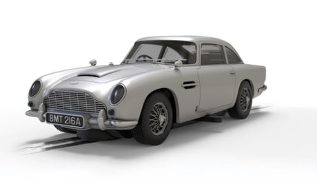 A detailed replica of the iconic Bond 007 Aston Martin DB5, showcasing luxury, performance, and cinematic history.