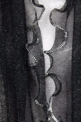 Black lurex scarf with curly edges, 150x50cm, lightweight, elegant for casual or formal wear.
