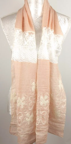 Soft peach lace and embroidery scarf, perfect for layering and adding elegance to any outfit. Versatile for all seasons.