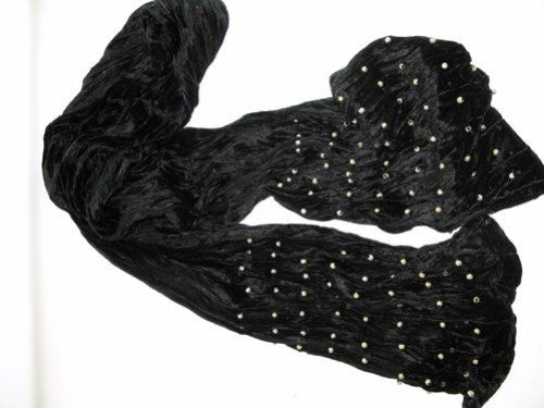 Luxurious black velvet décor piece with striking gold ball accent, perfect for enhancing any living space's elegance.