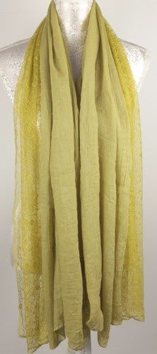 Vibrant lime lace and viscose fabric, perfect for elegant outfits and stylish accessories, offering comfort and versatility.