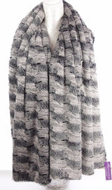 Elegant Raked Sands Shawl in soft textures, 72cm wide by 190cm long, perfect for layering and versatile styling.