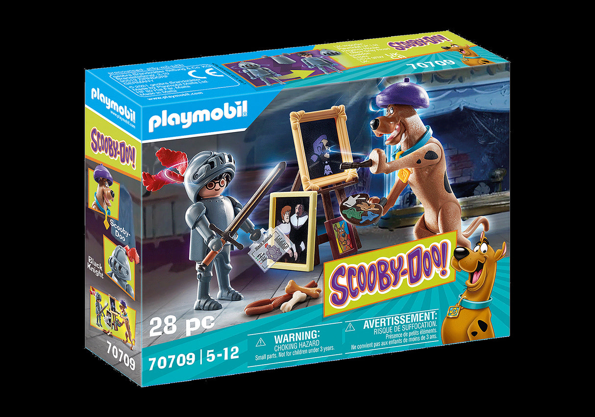 Playmobil SCOOBY-DOO! set featuring Scooby-Doo, Black Knight, ghost card, and painting accessories for adventurous mystery play.