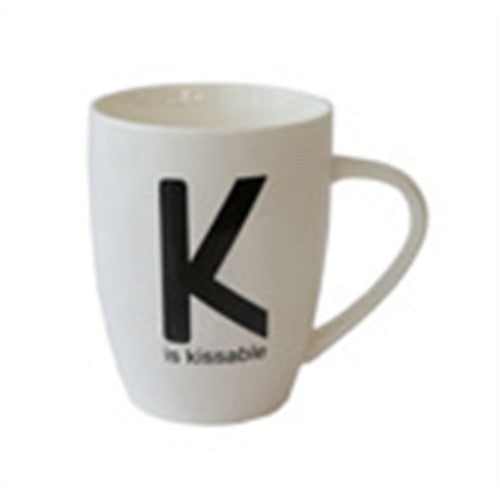 Black and white bone china mug with "K Is Kissable" text, perfect for coffee or tea, measuring 11x10cm.