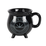 Imbolc Colour Changing Cauldron Mug featuring a yellow dragon and glowing sabbat symbols, crafted by Anne Stokes.