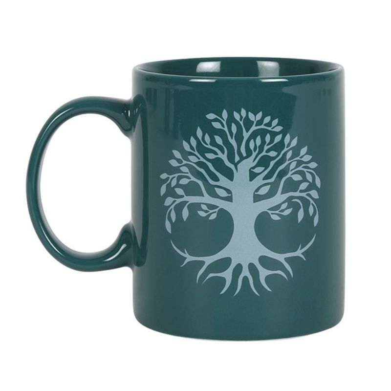 Tree of Life Green Ceramic Mug showcasing intricate design, perfect for daily beverages and thoughtful gifting.