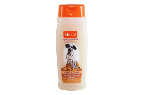 Hartz Oatmeal Shampoo in a 532mL bottle, designed for gentle cleansing of dogs with sensitive skin and a pleasant buttermilk scent.