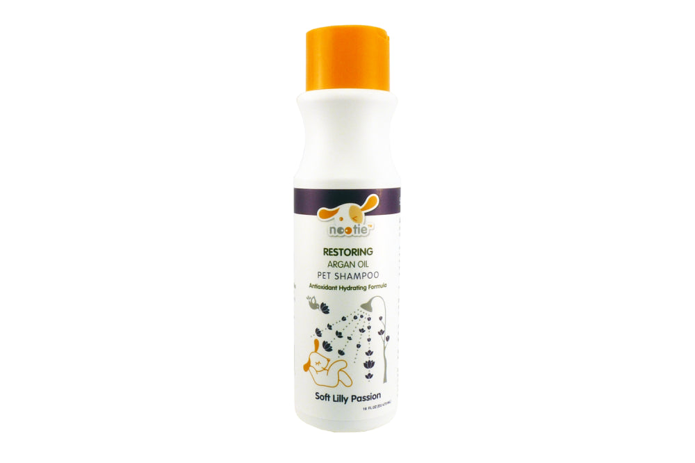 Botanical-infused Nootie Dog Shampoo in Soft Lilly Passion, 473ml, softens and shines coats, safe for sensitive skin.